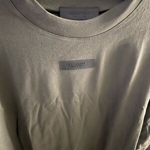 Brand new never worn Essentials tee oversized, size L